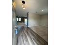 Bright and spacious entryway with wood-look floors at 462 Spotted Slipper Pl, Ruskin, FL 33570
