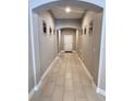 Bright entryway with tile flooring and neutral tones at 4801 Cypress Club Pl, Tampa, FL 33624