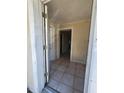 Inviting entryway with tiled floor, offering a glimpse into the layout of the home with multiple doorways at 4407 N 41St St, Tampa, FL 33610