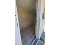 View into a room with tile flooring, light colored walls and trim and natural light at 4407 N 41St St, Tampa, FL 33610