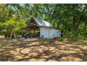Spacious workshop with metal roof and open sides at 16637 Livingston Ave, Lutz, FL 33559