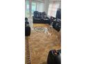Living room with tile floors and comfortable reclining furniture at 2905 W Osborne Ave, Tampa, FL 33614