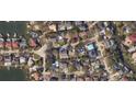 Aerial view showcasing home's location in a neighborhood at 5002 W Poe Ave, Tampa, FL 33629