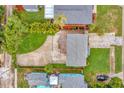 Aerial view of a well-maintained property showcasing a deck and lush yard; a peaceful retreat at 2866 15Th N Ave, St Petersburg, FL 33713