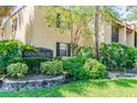 Siena Villas entrance with lush landscaping at 5306 Santa Rosa Ct # 342, Tampa, FL 33609