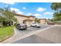 Condo building with parking lot and visitor parking spaces at 19029 Us Highway 19 N # 4-5, Clearwater, FL 33764