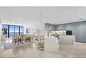 Modern kitchen with marble countertops and blue cabinetry at 2912 W Santiago St # 1703, Tampa, FL 33629