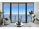 Bright living room with water view, comfy seating, and stylish decor at 2912 W Santiago St # 903, Tampa, FL 33629