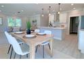 Kitchen and dining area with an open floor plan at 18390 Fremont Ave, Port Charlotte, FL 33954