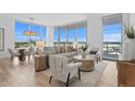 Bright living room with city views, featuring a comfortable sofa and stylish decor at 5120 Marina Way # 8805, Tampa, FL 33611