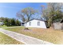Charming single-story home features a well-maintained front yard and attached garage at 3432 Danny Bryan Blvd, Tampa, FL 33619