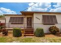 House exterior with steps and shutters at 4902 N Habana Ave, Tampa, FL 33614