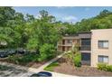 Aerial view showing building and surrounding area at 11702 Raintree Village Blvd # A, Temple Terrace, FL 33617
