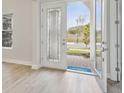 Bright and airy entryway with double doors that open to a welcoming front porch at 149 Hidden Estates Ct, Brandon, FL 33511