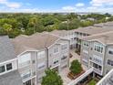 Aerial view of community building with courtyard at 800 S Dakota Ave # 440, Tampa, FL 33606