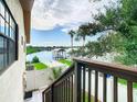 View from stairs showing waterfront access and dock at 9408 Oak St, Riverview, FL 33578