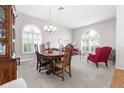 Formal dining room with wood table and chairs at 35506 Wickingham Ct, Zephyrhills, FL 33541