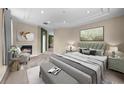Bright main bedroom featuring a fireplace and sitting area at 212 Excalibur Ct, Brandon, FL 33511