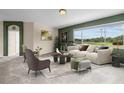 Living room with large windows, green accent wall, and neutral furniture at 212 Excalibur Ct, Brandon, FL 33511
