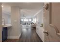 Bright and airy entryway leading to living room and kitchen at 4141 Bayshore Blvd # 1003, Tampa, FL 33611