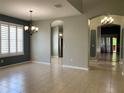 Bright dining room with tile floors and chandelier at 10308 Holland Rd, Riverview, FL 33578