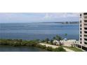 Scenic waterfront view with boats and lush vegetation at 6009 Sea Ranch Dr # 705, Hudson, FL 34667