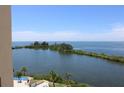 Breathtaking view of calm water, lush greenery, and distant horizon at 6009 Sea Ranch Dr # 705, Hudson, FL 34667