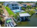 Luxury waterfront home with private dock and pool at 517 Treviso Dr, Apollo Beach, FL 33572