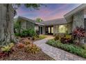 Landscaped walkway leading to the entrance of the house at 4302 Deepwater Ln, Tampa, FL 33615