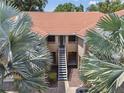 Building exterior with stairs and landscaping visible from above at 15215 Amberly Dr # 108, Tampa, FL 33647