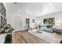 Living room features hardwood floors and ample natural light at 5021 17Th S Ave, Gulfport, FL 33707