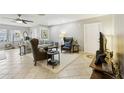 Spacious living room with comfortable seating and a large TV at 329 Grayston Pl # 112, Sun City Center, FL 33573