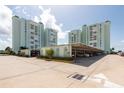 Covered parking garage with additional uncovered parking at 400 64Th Ave # 704, St Pete Beach, FL 33706