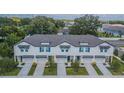 Five-unit townhome building with individual garages at 2714 Chestnut Creek Pl, Brandon, FL 33510