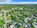 Expansive aerial view of a residential neighborhood featuring lush greenery and beautiful homes at 3128 17Th N St, St Petersburg, FL 33713