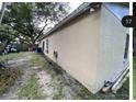 Side view of the house, showing additional exterior features at 4605 N 39Th St # 1/2, Tampa, FL 33610