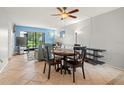 Bright dining area with a table and chairs at 103 W Cypress Ct # 75, Oldsmar, FL 34677