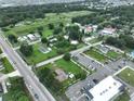 Aerial view of residential property near major intersection with commercial buildings at 11348 Pine St, Riverview, FL 33578