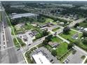 Aerial view showing property near intersection, gas station, and storage facility at 11348 Pine St, Riverview, FL 33578