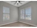 Bright office with neutral walls and hardwood floors at 3410 E Henry Ave, Tampa, FL 33610