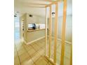 Dining room with view of kitchen and living room at 7156 E Bank Dr # 7156, Tampa, FL 33617