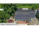 Aerial view of a home with solar panels at 8816 Ascot Ct, Tampa, FL 33634