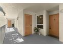 Building hallway with access to condo units at 16308 Gulf Blvd # 209, Redington Beach, FL 33708