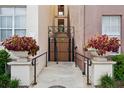 Private gated entrance with lush landscaping at 520 S Armenia Ave # 1232, Tampa, FL 33609