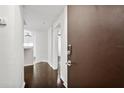 Bright entryway with hardwood floors and keyless entry at 520 S Armenia Ave # 1232, Tampa, FL 33609