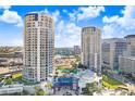 Luxury high-rise building with city and water views; resort-style amenities at 1209 E Cumberland Ave # 807, Tampa, FL 33602
