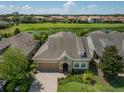 Bird's-eye view of a single-Gathering home and neighborhood at 13939 Swallow Hill Dr, Lithia, FL 33547