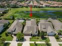 Aerial view showcasing a home's location within a residential community at 13939 Swallow Hill Dr, Lithia, FL 33547