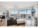 Spacious living room with floor-to-ceiling windows, offering stunning city views at 1209 E Cumberland Ave # 807, Tampa, FL 33602