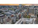 Sunset aerial view of apartment building and surrounding city at 1208 E Kennedy Blvd # 734, Tampa, FL 33602